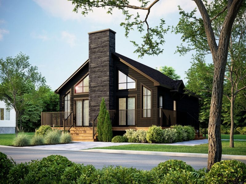 Maison préfabriquée plain-pied du modèle Harfang de style chalet classique. Vue de l'extérieur avant.