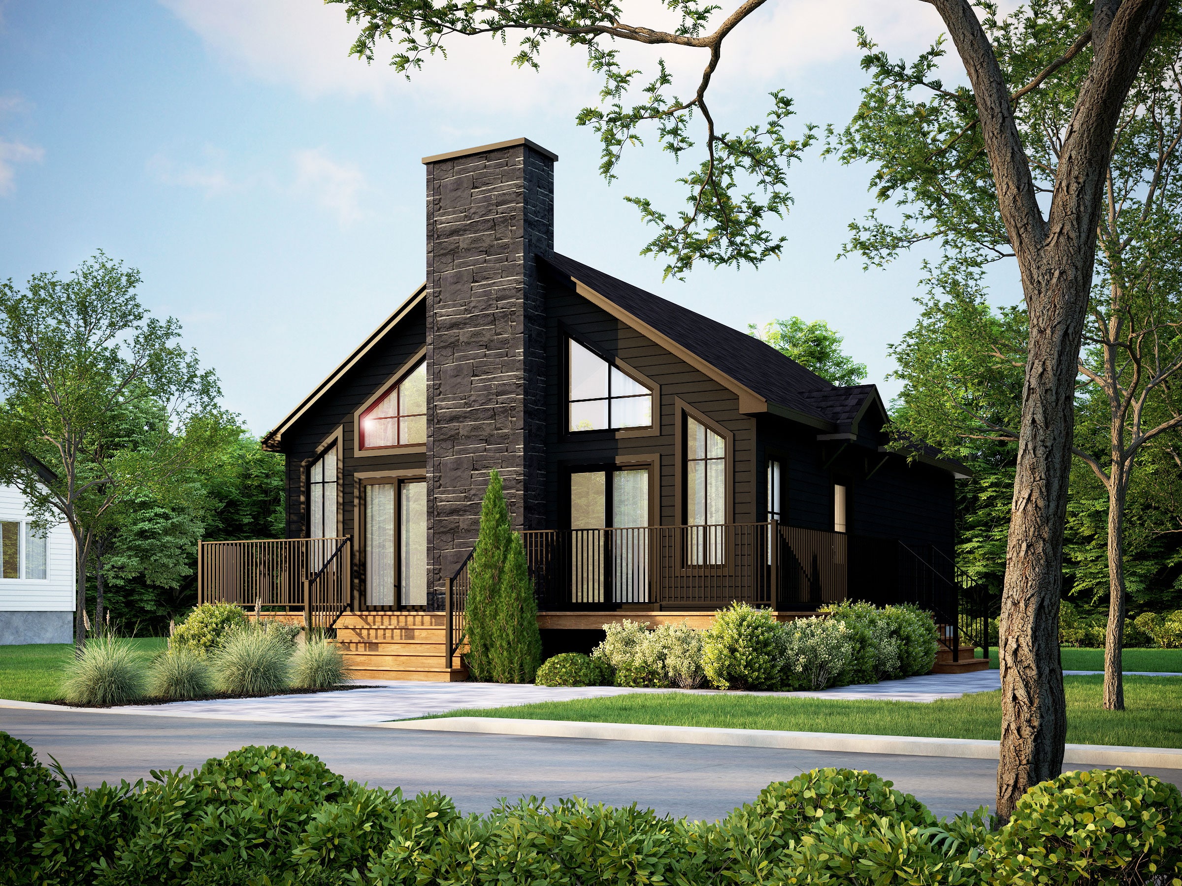 Maison préfabriquée plain-pied du modèle Harfang de style chalet classique. Vue de l'extérieur avant.