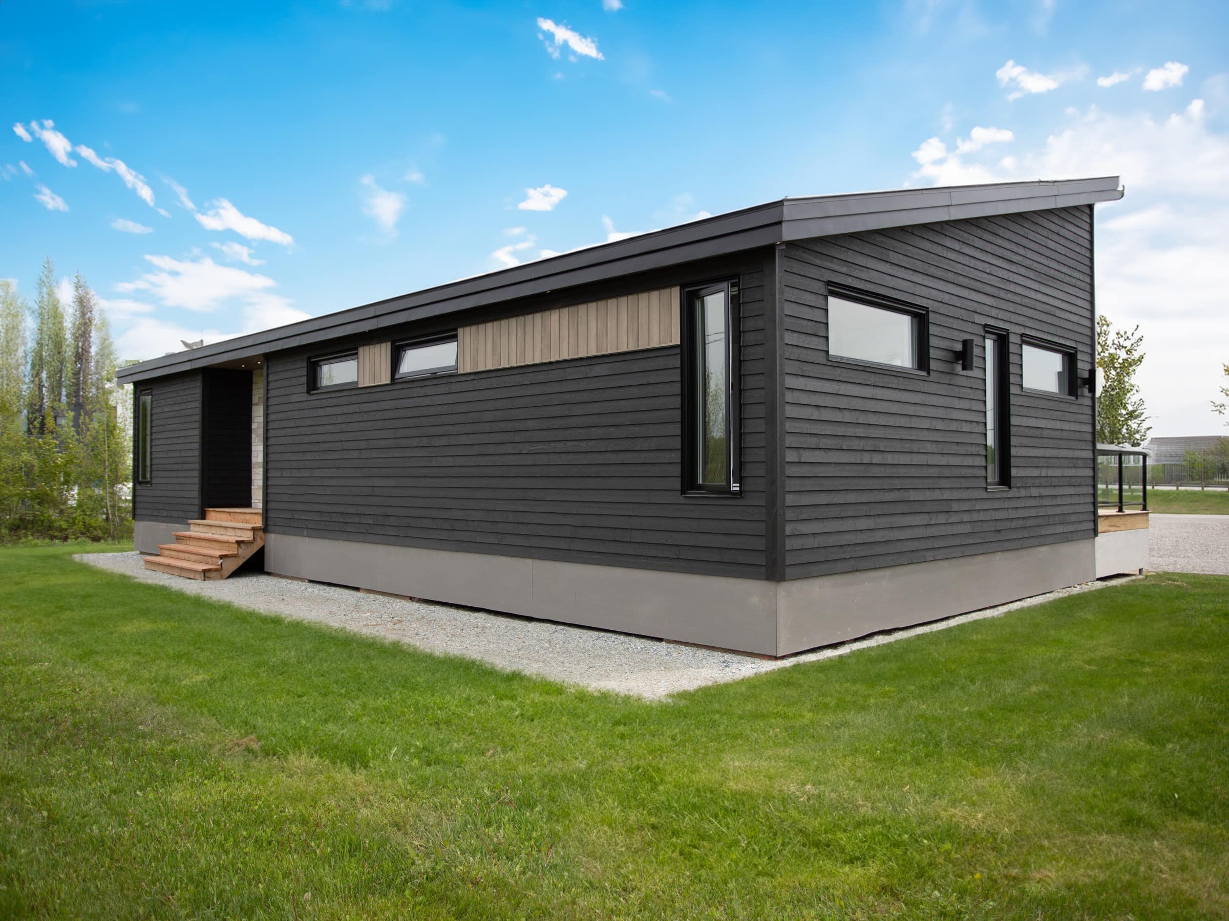 L'Esplanade est un chalet de style méditerranéen. Une réalisation réel avec la vue de l'extérieur.