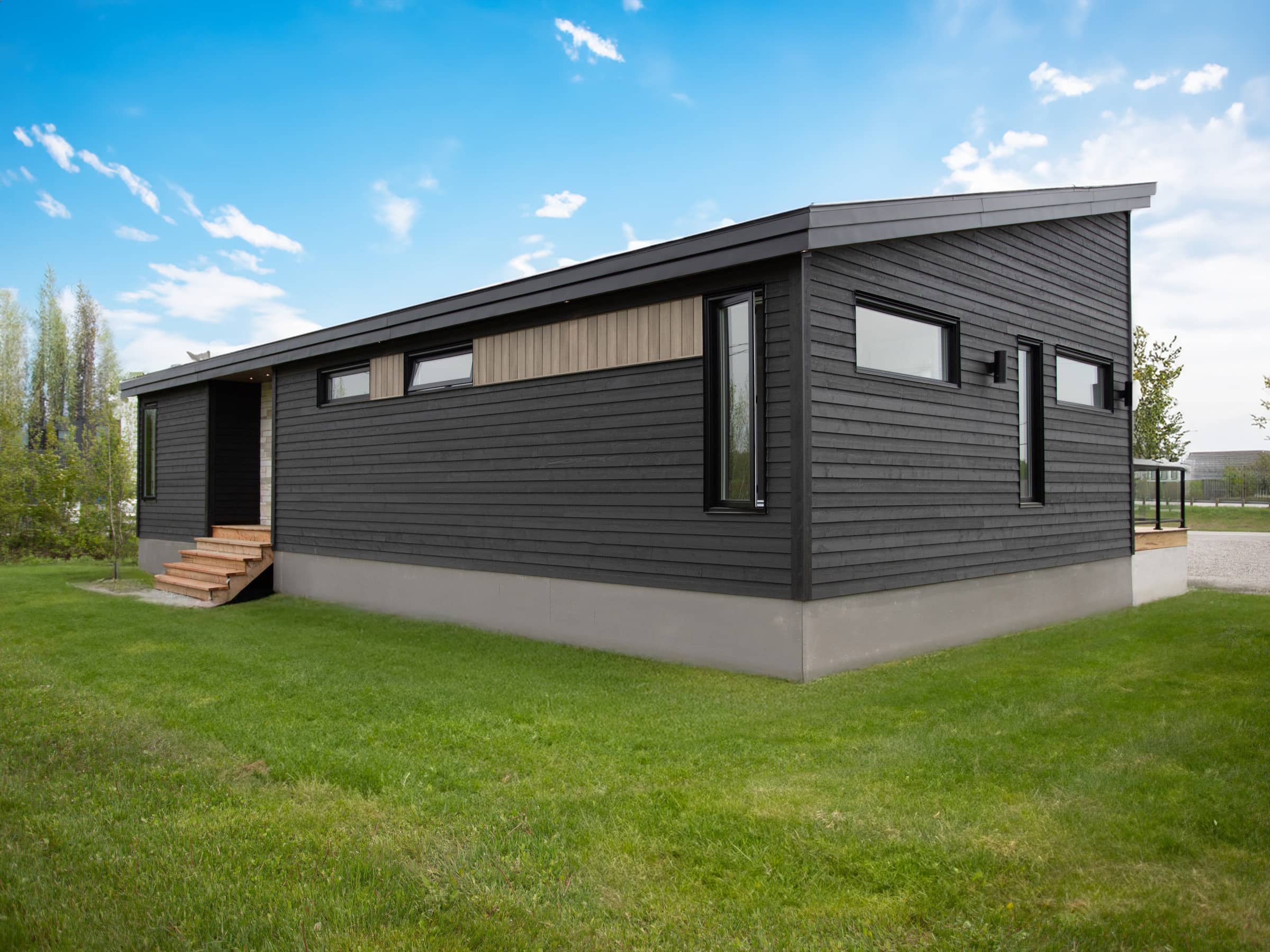 L'Esplanade est un chalet de style méditerranéen. Une réalisation réel avec la vue de l'extérieur.