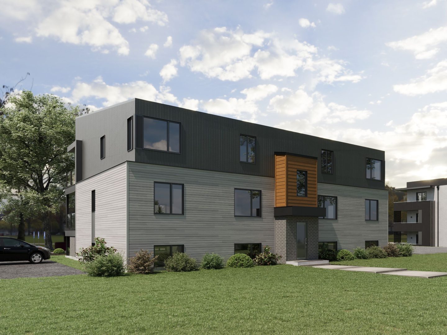 Modèle de multilogement nommé Vinkel-6, des logements qui ont un style contemporain. Vue de l'extérieur arrière.