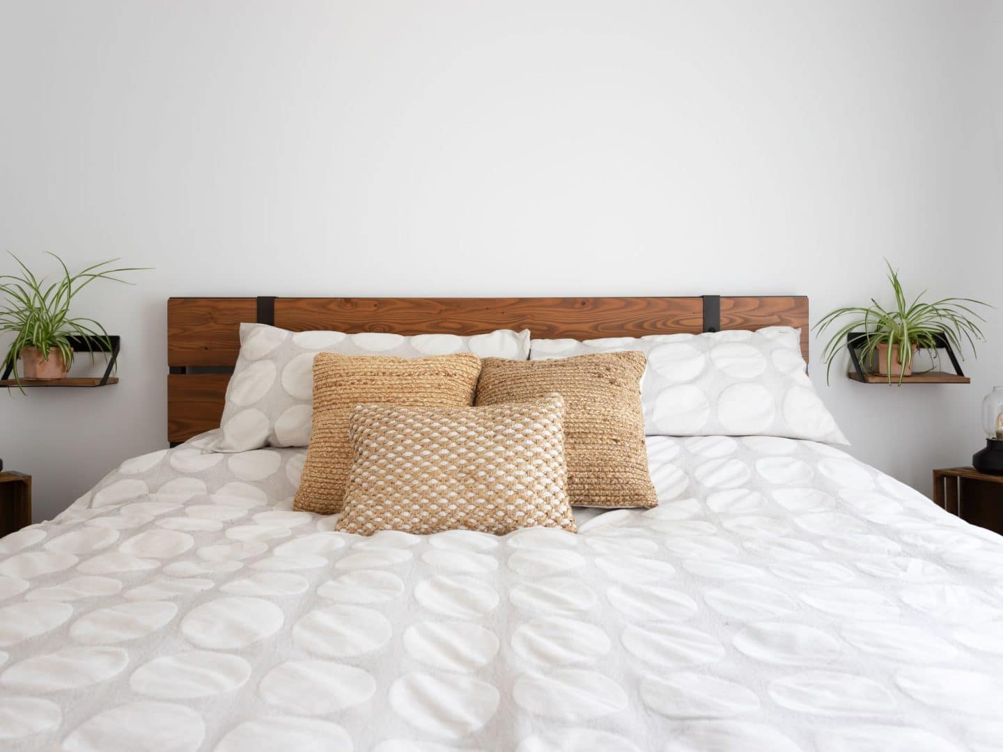 A realization of a chalet called Faucon. The second floor is classically styled, as seen from the bedroom.